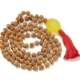 Show details for Rudraksha Mala mit facettiertem Trommelanhänger aus gelbem Aventurin Picture of Rudraksha Mala mit facettiertem Trommelanhänger aus gelbem Aventurin